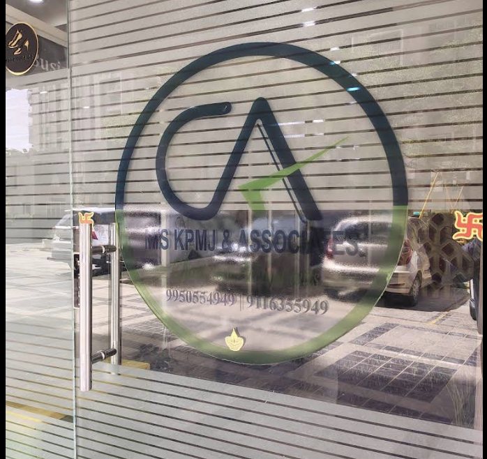 KPMJ & Associates branded glass-door entrance